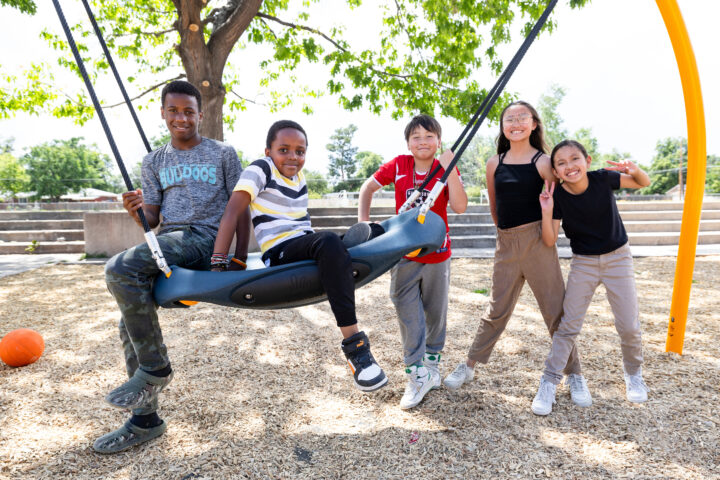 Children play on a playground built by KABOOM! at Montview Math & Health Science Elementary in Aurora, Colorado on June 20, 2024. Photo by Ben Swanson / Denver Broncos