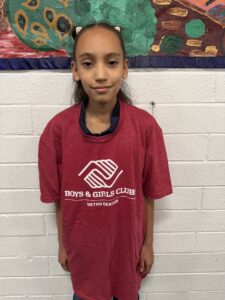 Image of Allison in a Boys & Girls Club of Metro Denver shirt